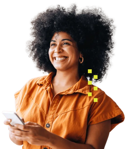 Photo of a smiling Black woman with natural hair holding a cell phone